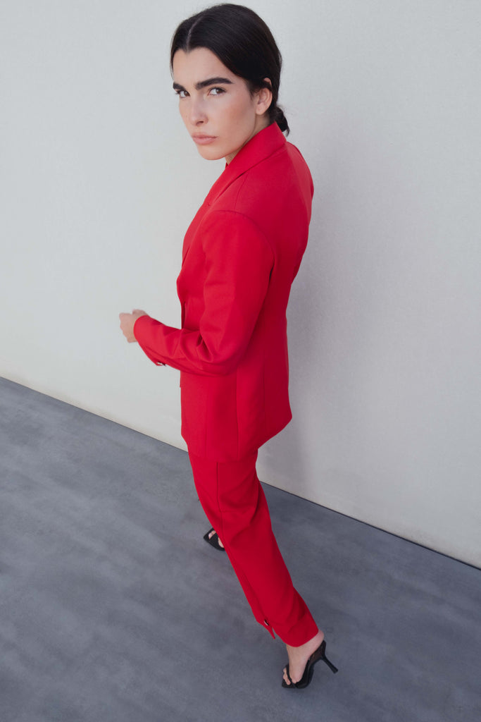 Calça com Botão Prateado