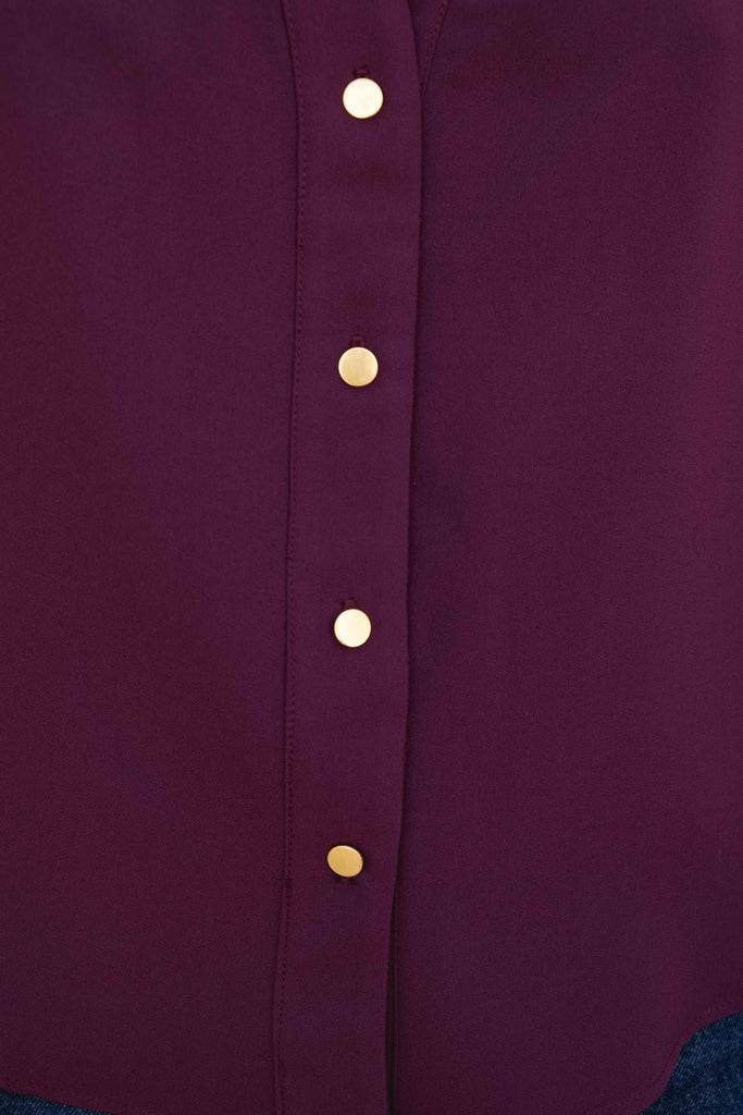 Camisa com Manga Dobrada